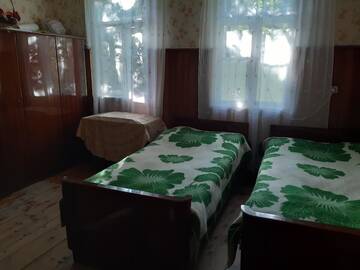 Фото номера Двухместный номер с 2 отдельными кроватями Гостевой дом GUESTHOUSE ARQI г. Khulo 4